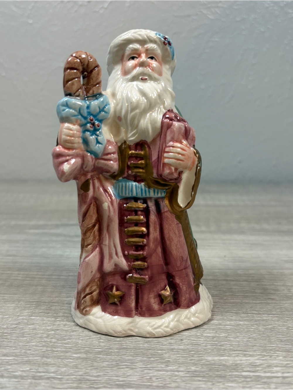 Vintage pink and green hand painted ceramic santa clause bell figurine